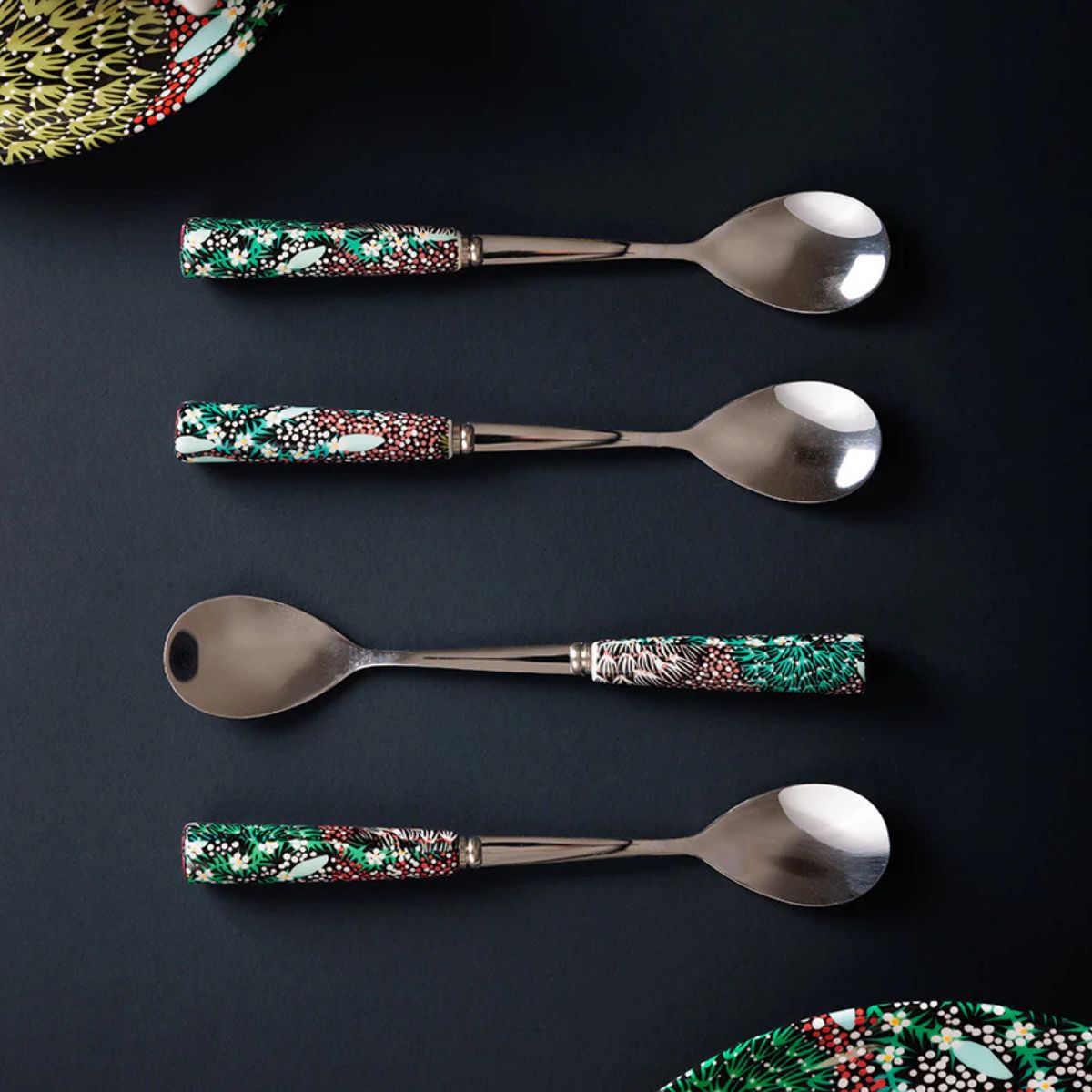 Set of four aboriginal decorated teaspoons with artwork by coral hayes pananka