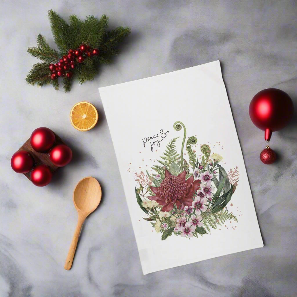 Floral design on a white card with 'Peace & Joy' text