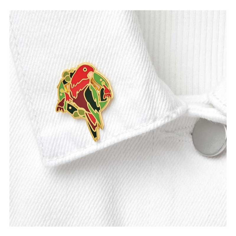 king parrot christmas brooch on collar